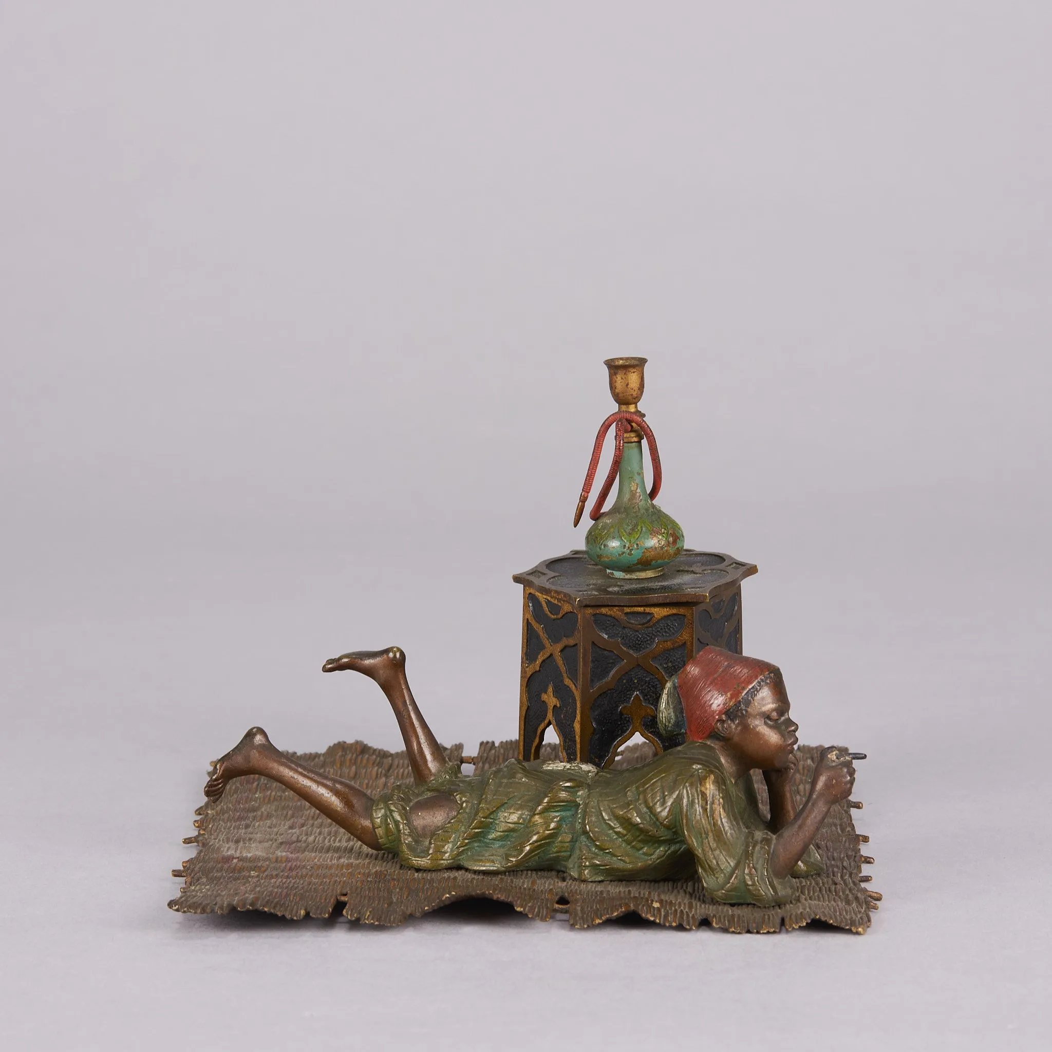 "Boy on Rug Inkwell" by Franz Bergman