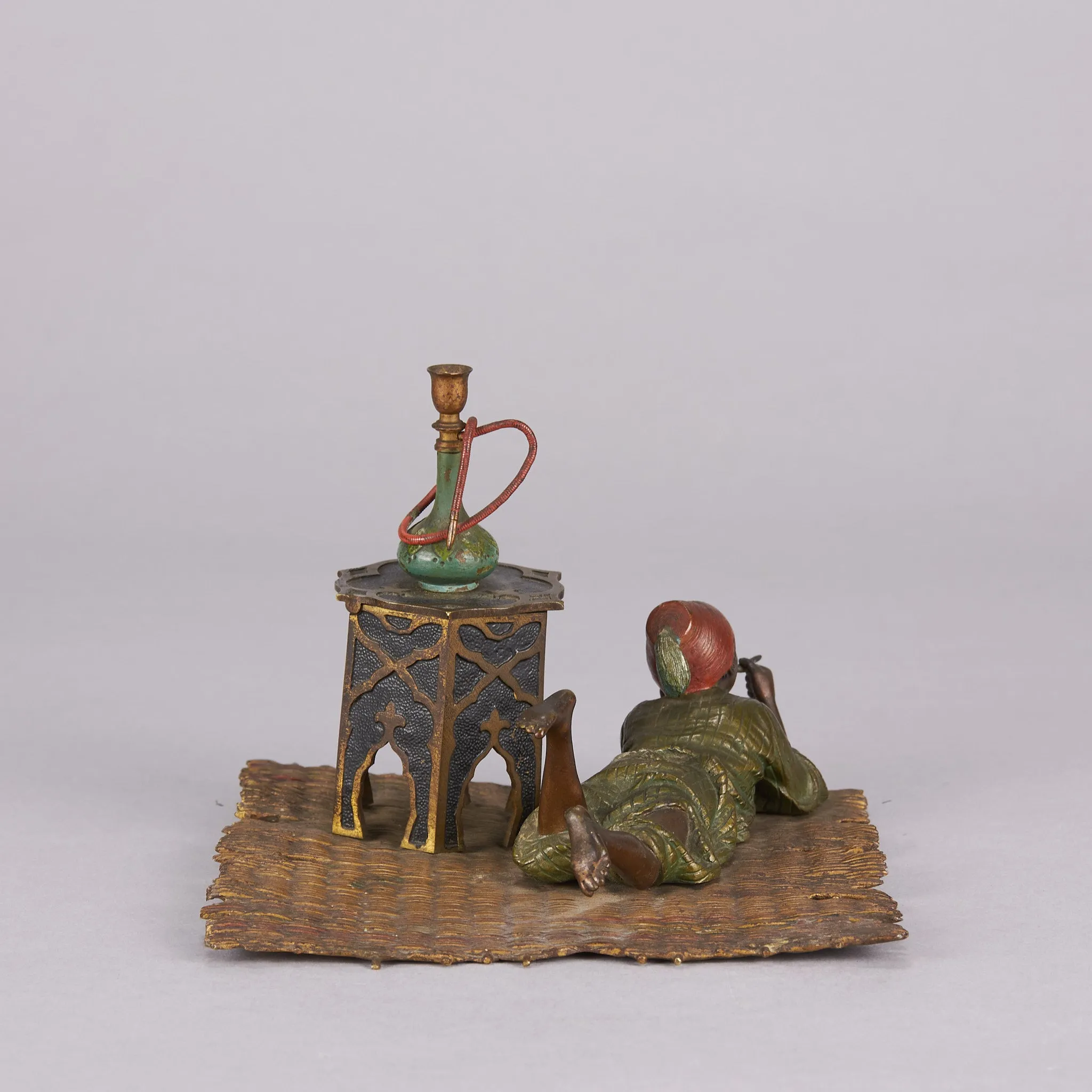 "Boy on Rug Inkwell" by Franz Bergman