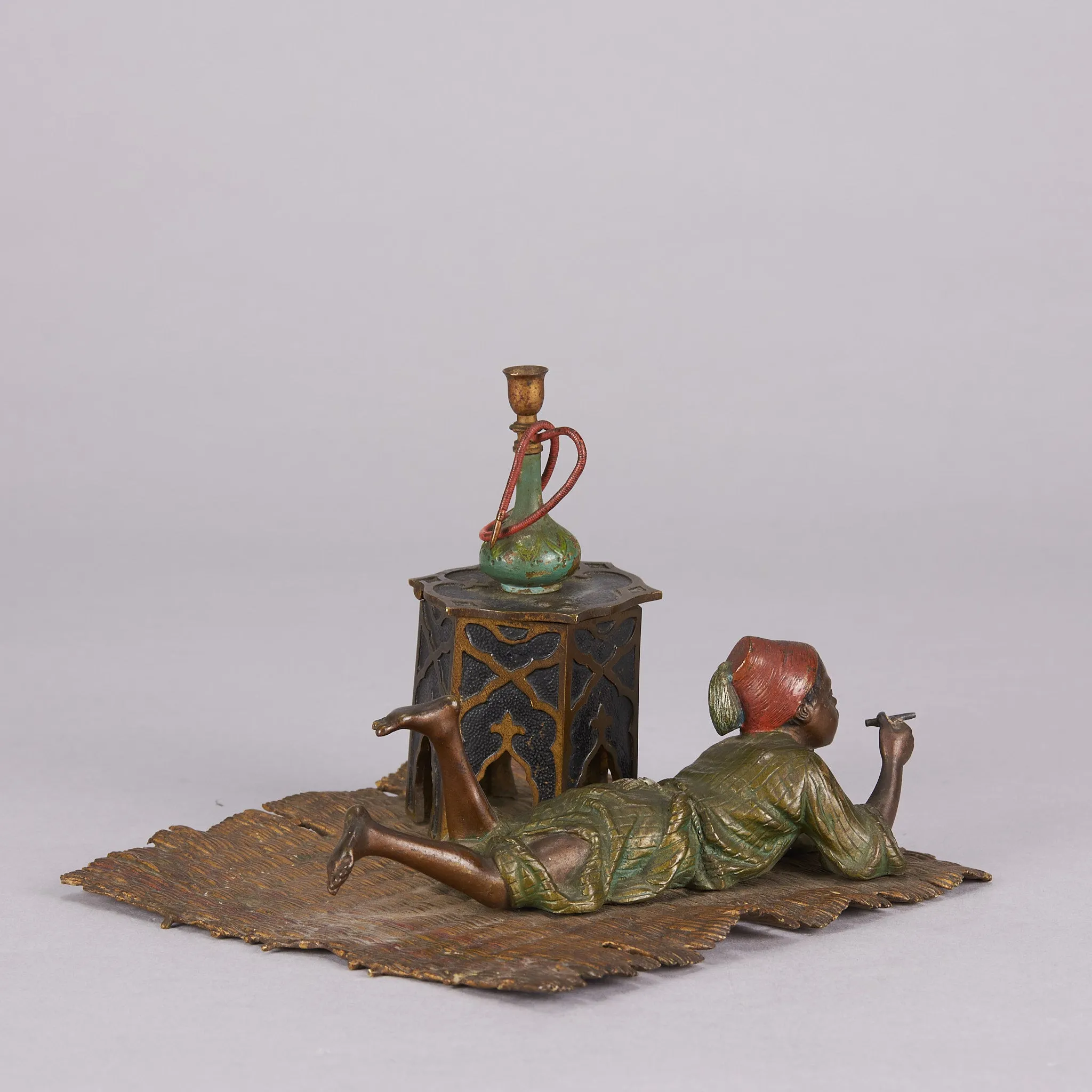 "Boy on Rug Inkwell" by Franz Bergman