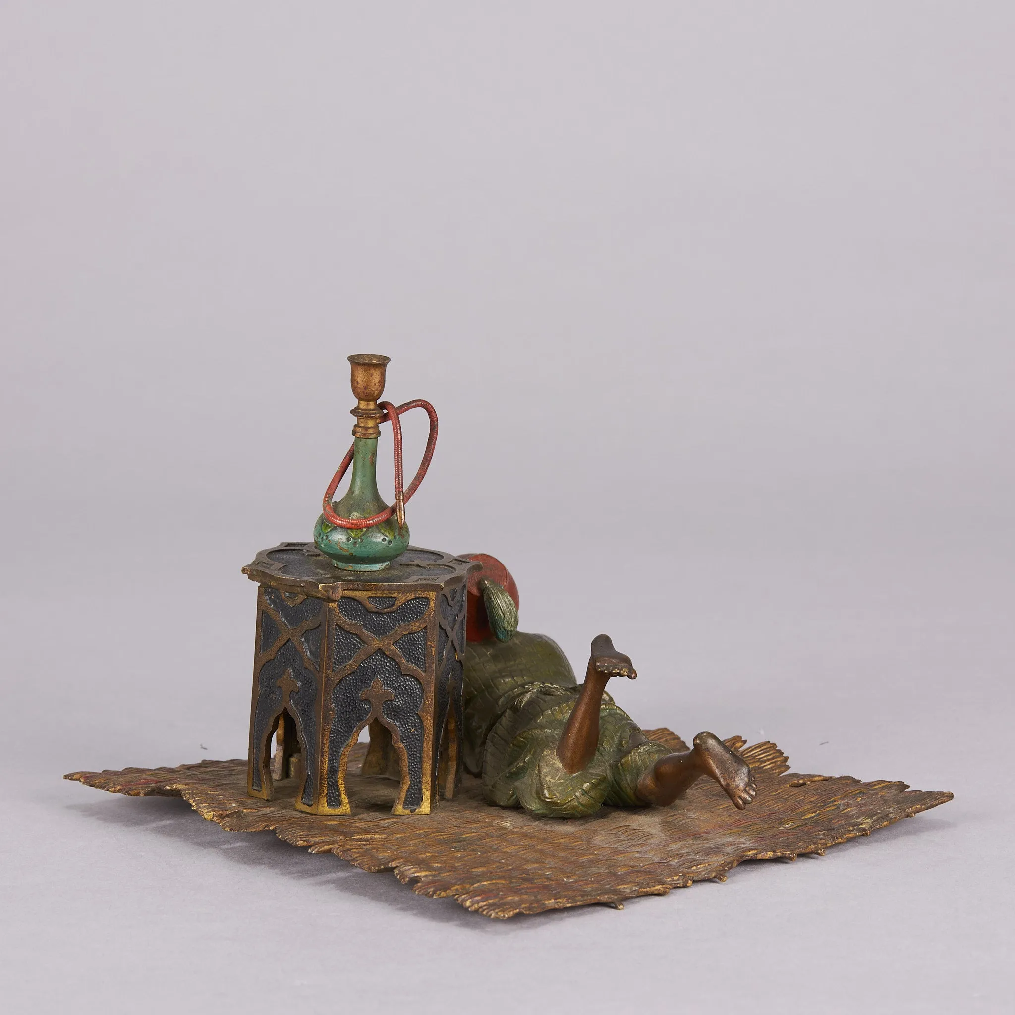 "Boy on Rug Inkwell" by Franz Bergman