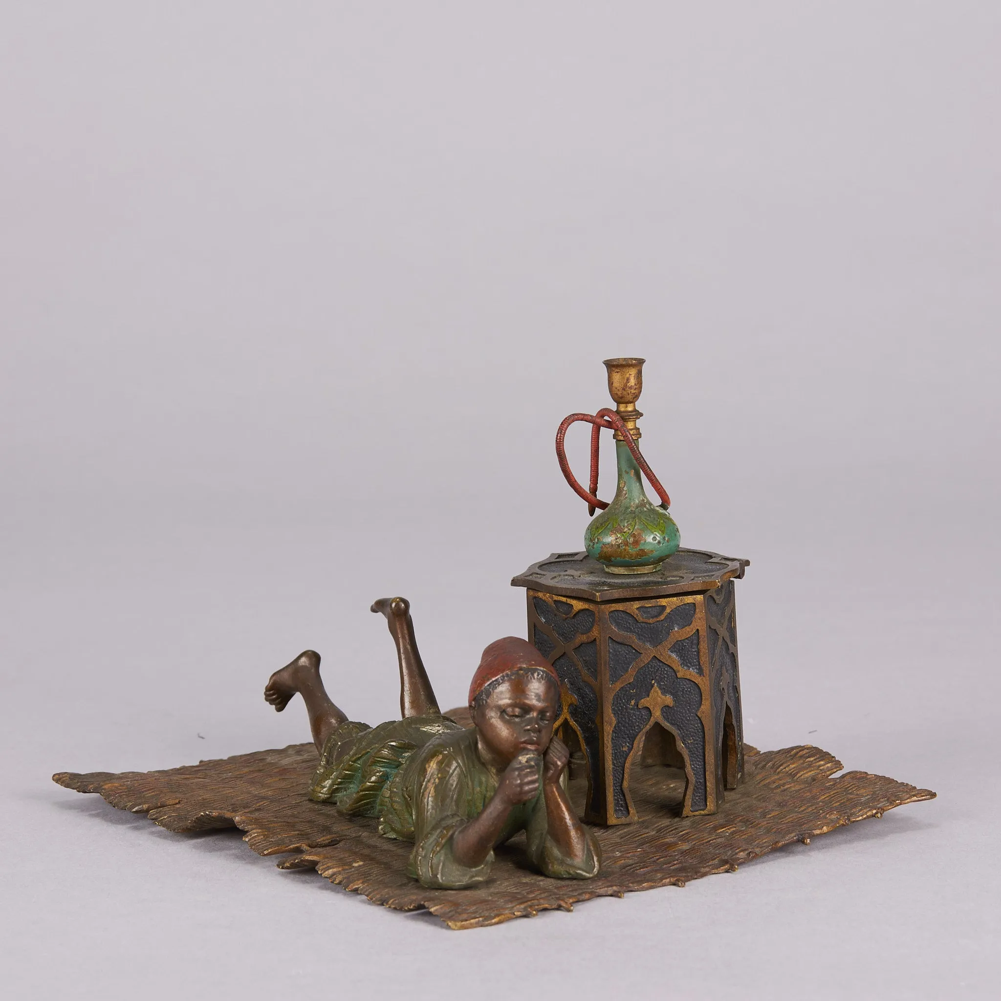 "Boy on Rug Inkwell" by Franz Bergman