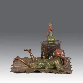 "Boy on Rug Inkwell" by Franz Bergman