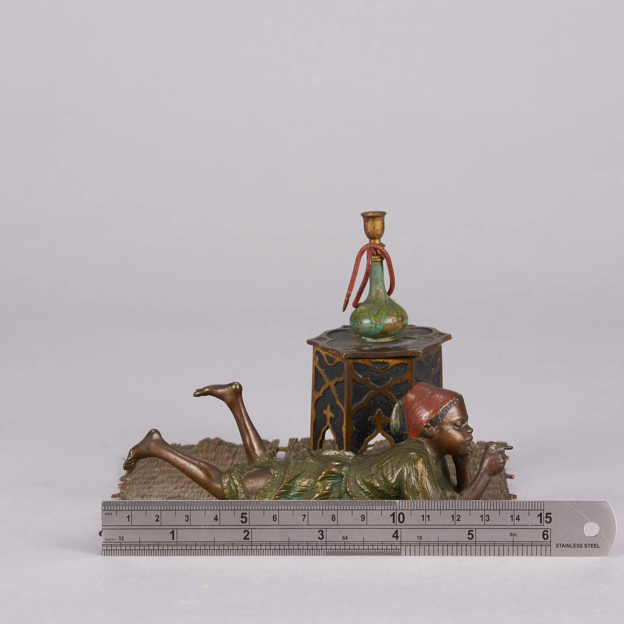 "Boy on Rug Inkwell" by Franz Bergman