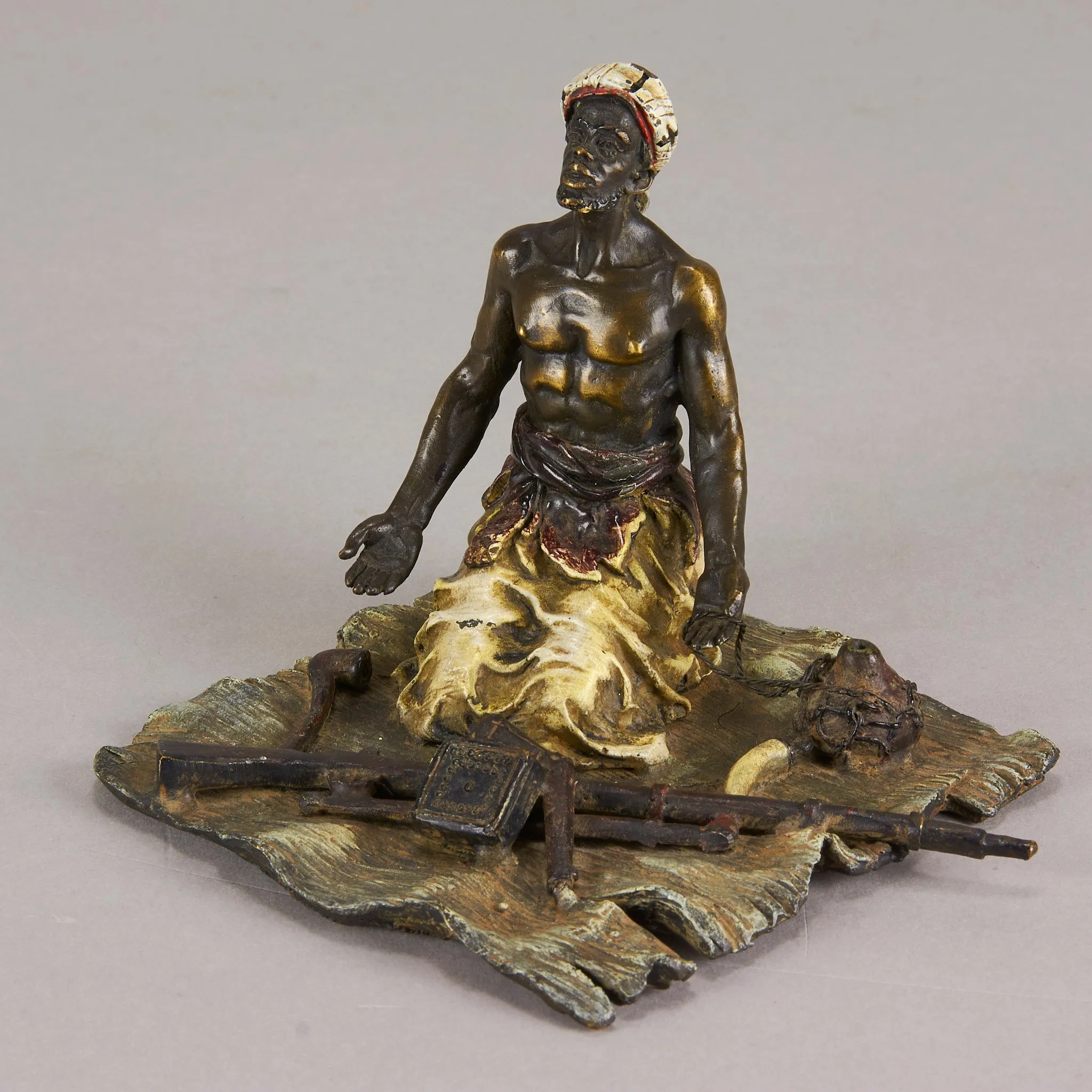 "Seated Arms Dealer" by Franz Bergman