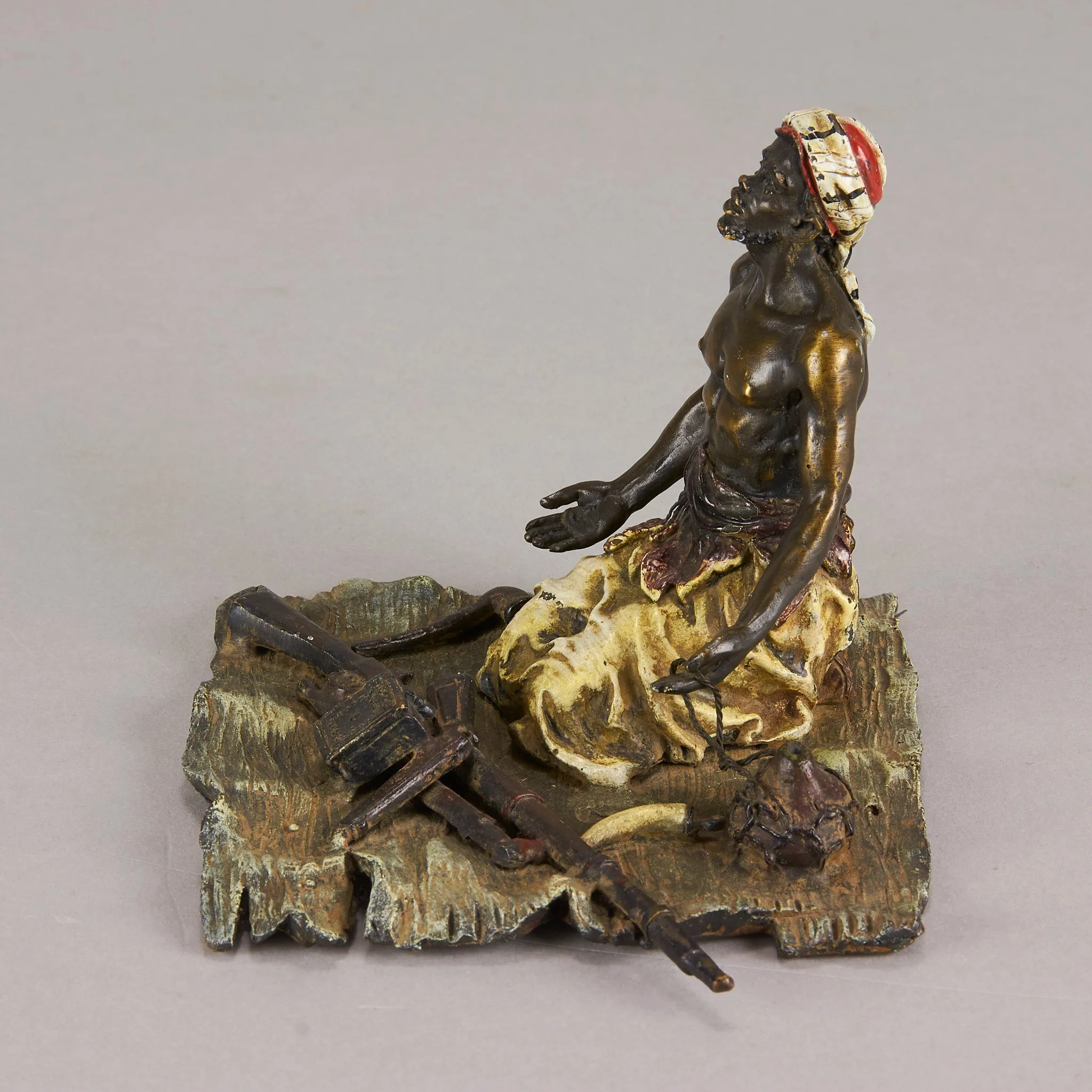 "Seated Arms Dealer" by Franz Bergman
