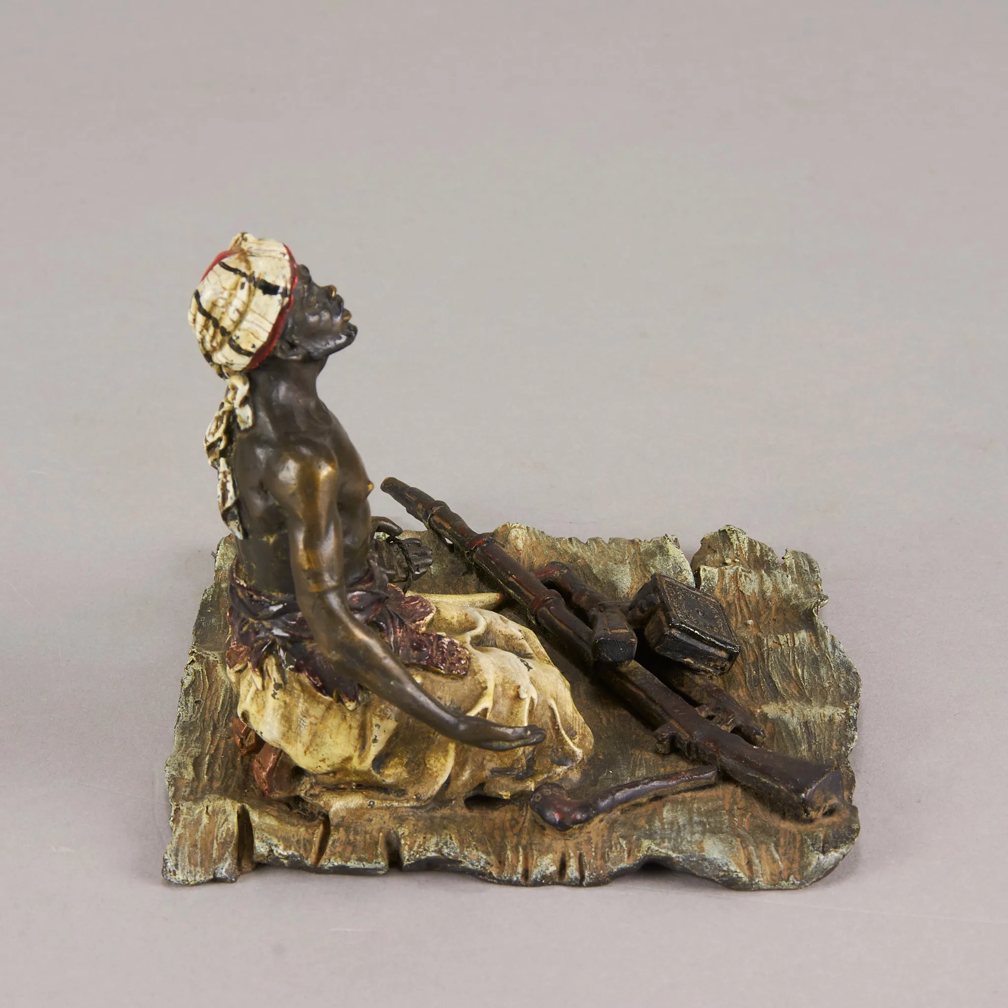 "Seated Arms Dealer" by Franz Bergman
