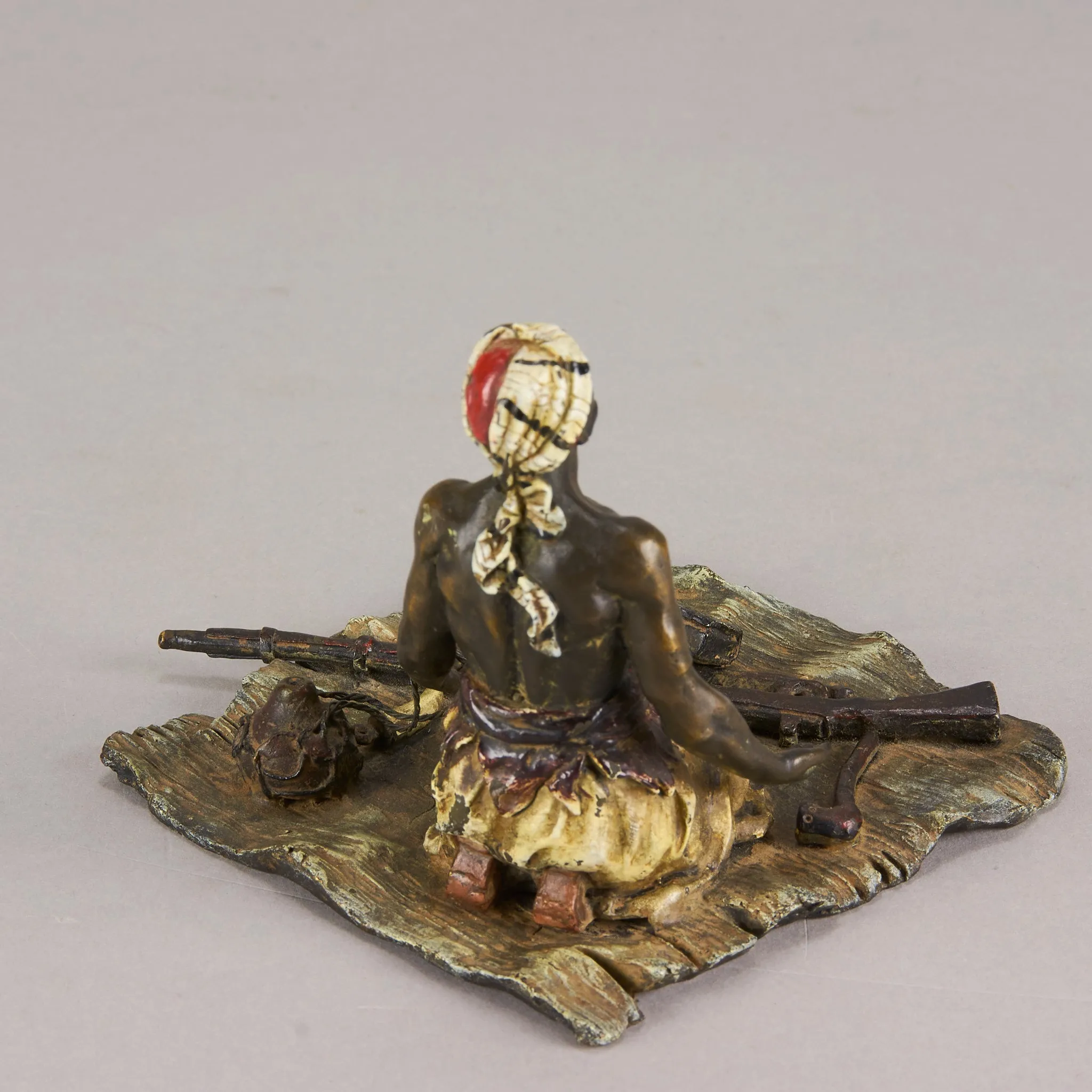 "Seated Arms Dealer" by Franz Bergman