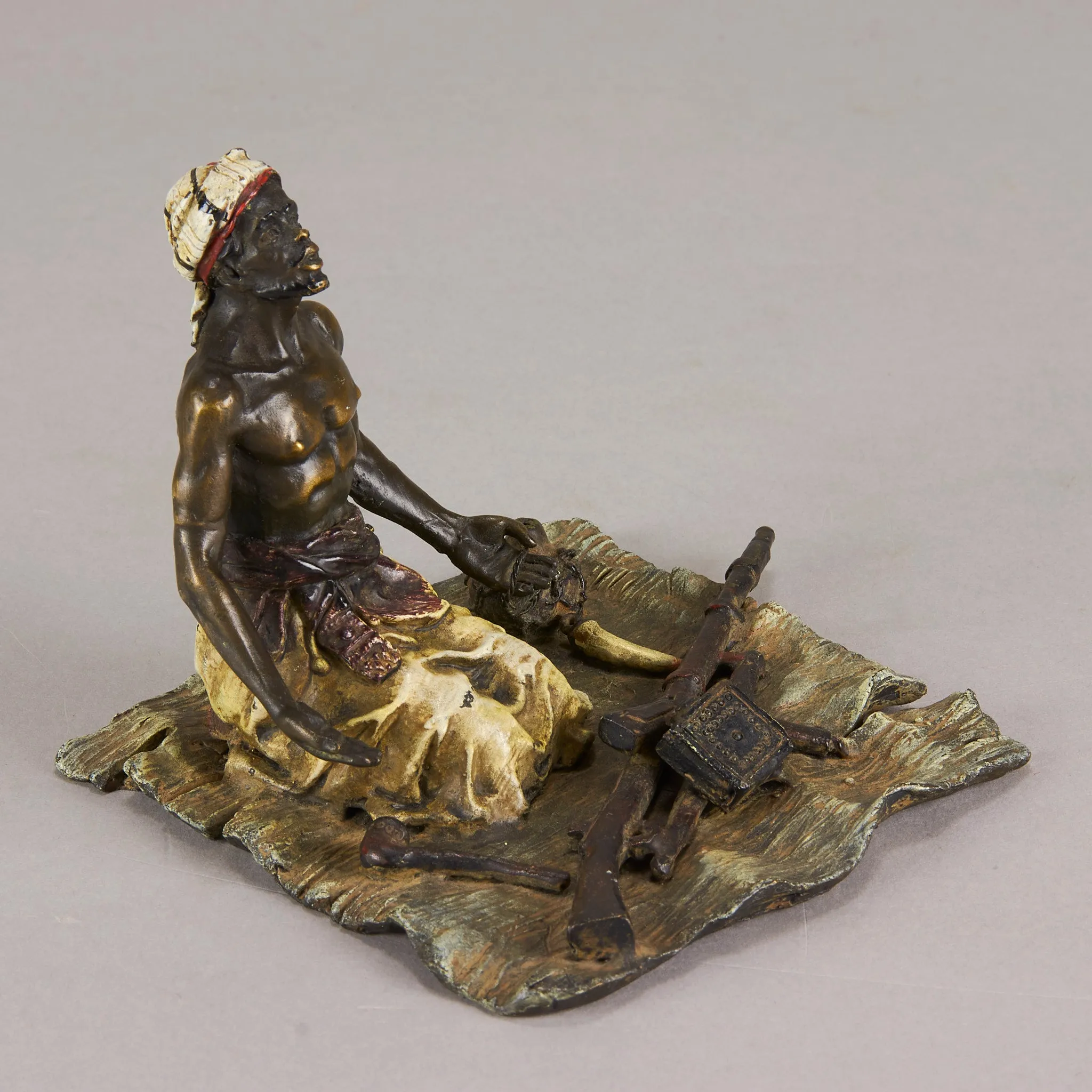 "Seated Arms Dealer" by Franz Bergman