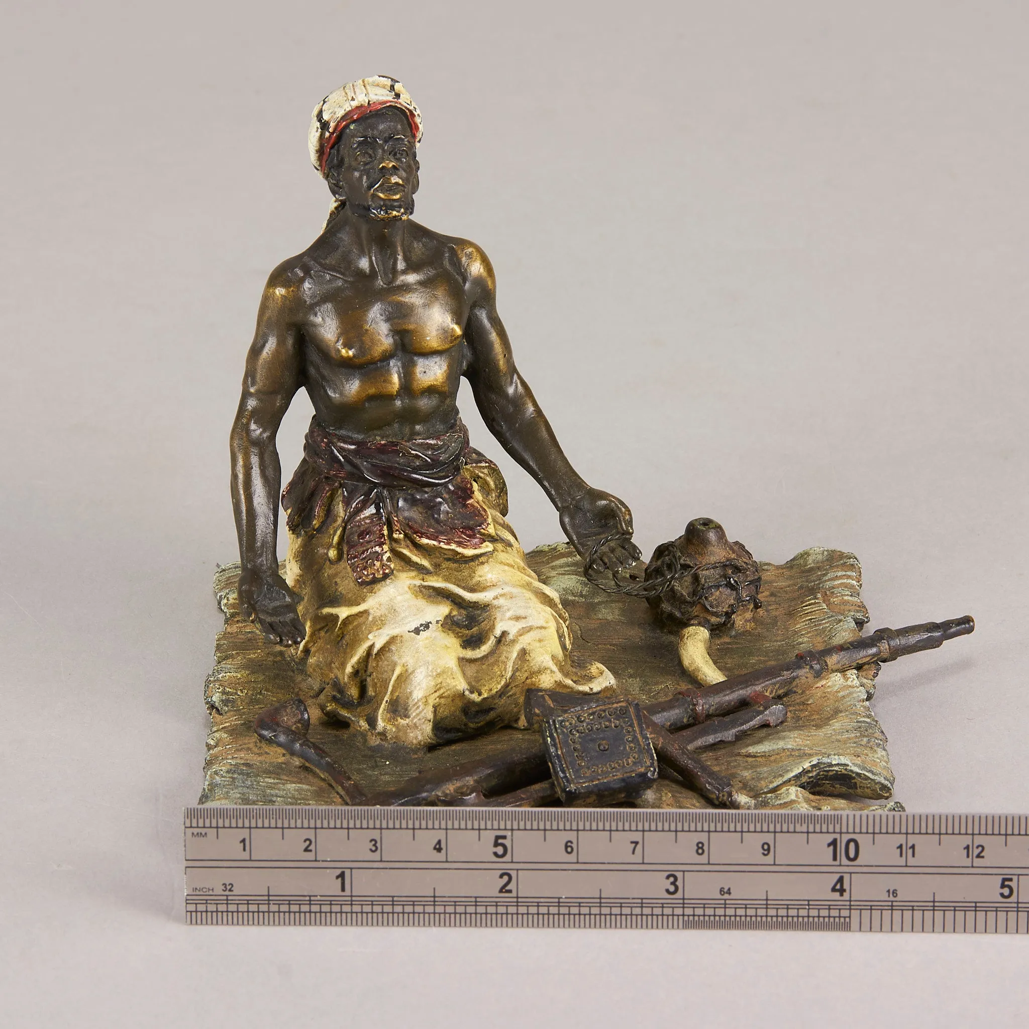 "Seated Arms Dealer" by Franz Bergman